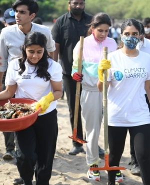 Bhumi Pednekar cleaning up with team 