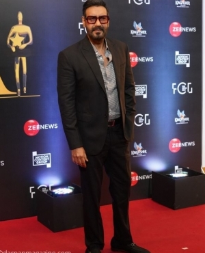 Ajay Devgn looks classy in his suit with glasses 
