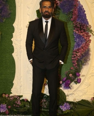 Sunil Shetty poses for the press 