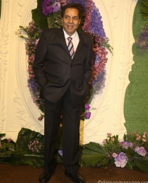 Grandpa Dharmendra poses for the press 