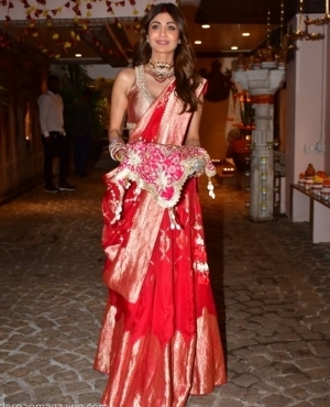 Shilpa Shetty looks gorgeous in her red lehenga for the festivities 