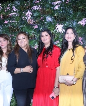 Seema Singh goes for an all black look with her brunette/blonde hair as she gets snapped with guests at the restaurant 