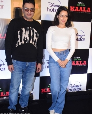 Bhushan Kumar takes a photo with the gorgeous Shraddha Kapoor 