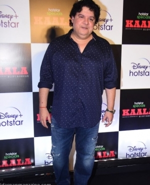 Sajid Khan take a pic on the red carpet in his polka dot shirt and jeans 