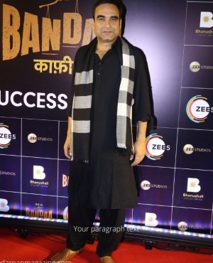 Pankaj Tripathi goes for a black Pathaan suit 