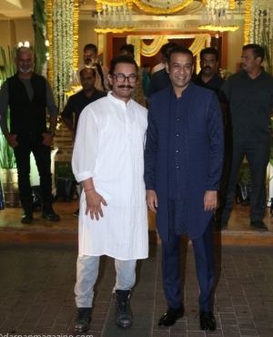 Amir Khan takes a photo with Madhu Mantena 