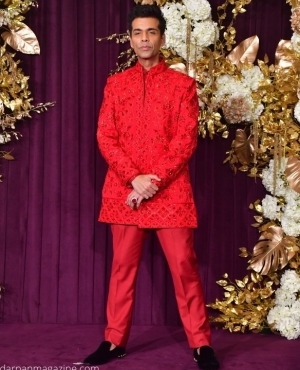 Karan Johar shines in red 