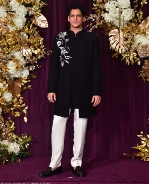 Vijay Verma looks dapper as he gets clicked by the press 