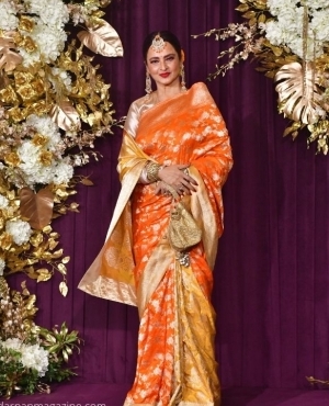 The evergreen Rekha is beautiful in gold and orange 