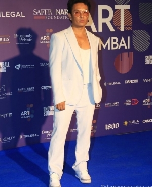 Fashion Designer Prabal Gurung looks great in his white suit 