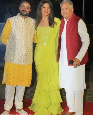 Priyanka Chopra poses with her brother Siddharth and another family member 