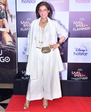 Dimple Kapadia looks great in white with snake leather high heels 