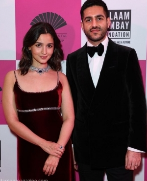 Alia Bhatt and Rajiv Nathwani strike a pose for the press 