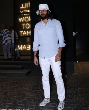 Riteish Deshmukh poses for the press 