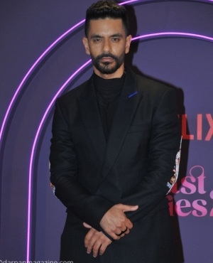 Angad Bedi looks hot as he poses for the press 