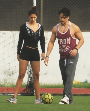 Tiger Shroff kicks the ball with girlfriend Disha Patani