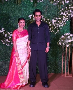 Rajkummar Rao and his wife Patralekhaa in a hot pink silk saree 