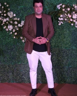Varun Sharma opts for brown blazer and white pants 