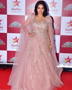 Rupali Ganguly looks glamorous in her evening dress 