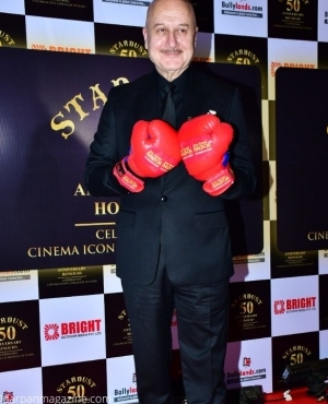 Anupam Kher brings out the gloves 