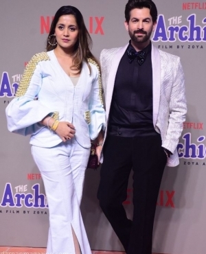 Neil Nitin Mukesh looks great in his suit alongside his wife 