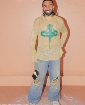 Orhan Awatramani goes for a casual look with sweater and jeans 