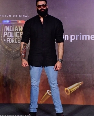 Nikitin Dheer shows off his tattoos and is hotness with sunglasses on 