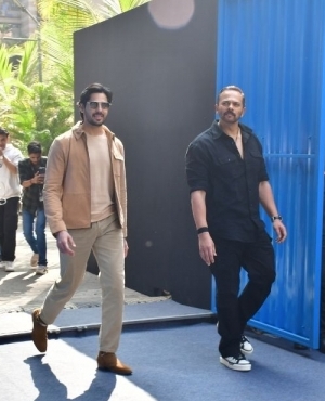 Sidharth Malhotra and director Rohit Shetty walk in with full swagger for the trailer launch