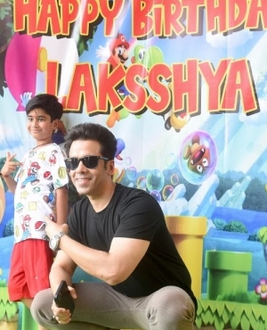 Tusshar Kapoor poses with his son Lakkshay Kapoor 