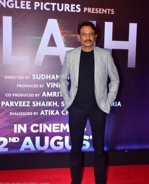 Rajesh Tailang looks great in his grey blazer and black pants 