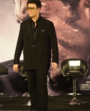 Film producer Karan Johar is all smiles on stage 