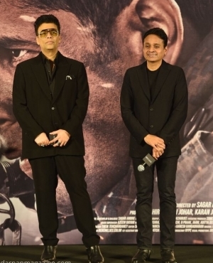 Producers Karan Johar and Apoorva Mehta get clicked on stage 