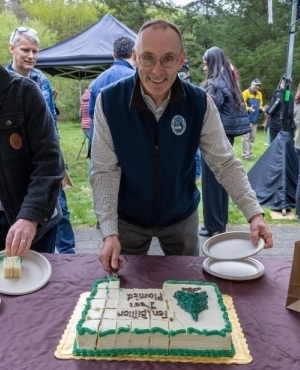 Attendees get ready to eat cake 