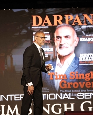 Tim Singh Grover is on stage 