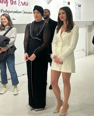 A captivated audience listens to Jasmeet's journey and is wowed by the photos she has taken 