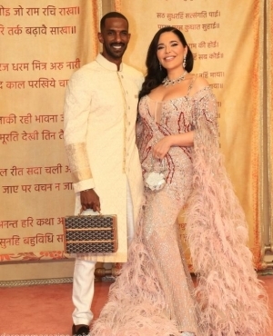 Huda Beauty's Mona Kattan alongside husband Hassan Elamin   