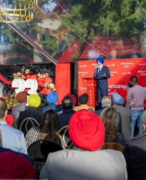 Mr. Baldev Bath addresses those at the anniversary and scholarship event 