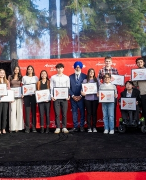 Mr.Bath poses for a group photo with all the recipients 