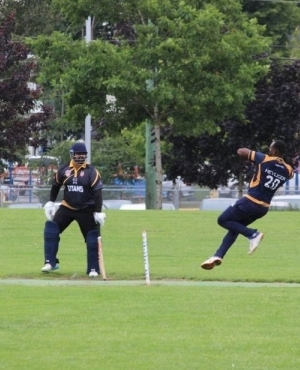 Players on the field in full swing 