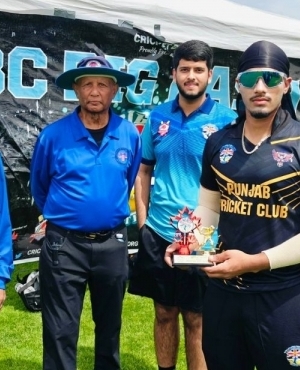 Coaches present trophy