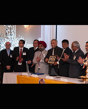 Mr. K Raghu, President ICAI presenting a memento to Vijay Kumar Gupta, Chairman, British Columbia Chapter of ICAI at inauguration function of British Columbia Chapter of ICAI