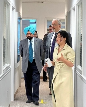 Phalak Betab, Marketing, Communications & Fundraising Officer at PICS Society leads the tour for Jim DeHart,  Consul General of US in Vancouver