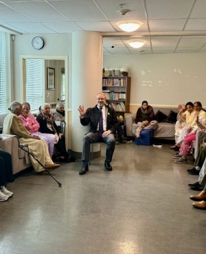 Jim DeHart mingles with seniors at Guru Nanak Diversity Village 