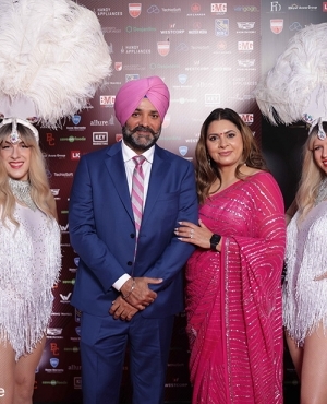 Gursharan Dhaliwal of Kraft Mortgages alongside wife 