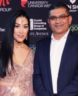 Realtor Mayor Arora of One Flat Fee and his wife 