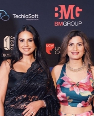 Guests happy to be clicked at the event 