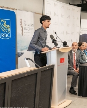 Student who is part of the Punjabi language program takes to the podium to say a few words 