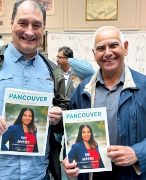 Charlie Smith of the Georgia Straight and Canadian Punjabi language author Sadhu Binning pose for a picture at the event 