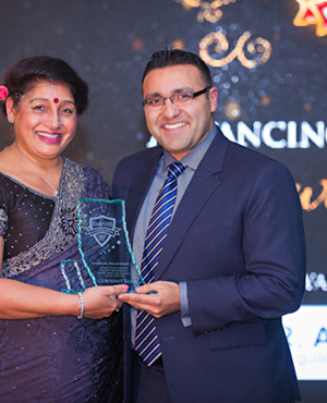 Gunwant Bains receives the Advancing Philanthropy award from Dr. Aly Kanani, Orthodontist, BC Orthodontics Group 