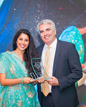 Anoop Virk receives the Young Wonder award from Matthew Grant, Director Marketing and External Affairs SFU Surrey